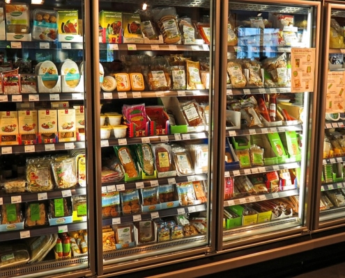 A row of commercial refrigerators